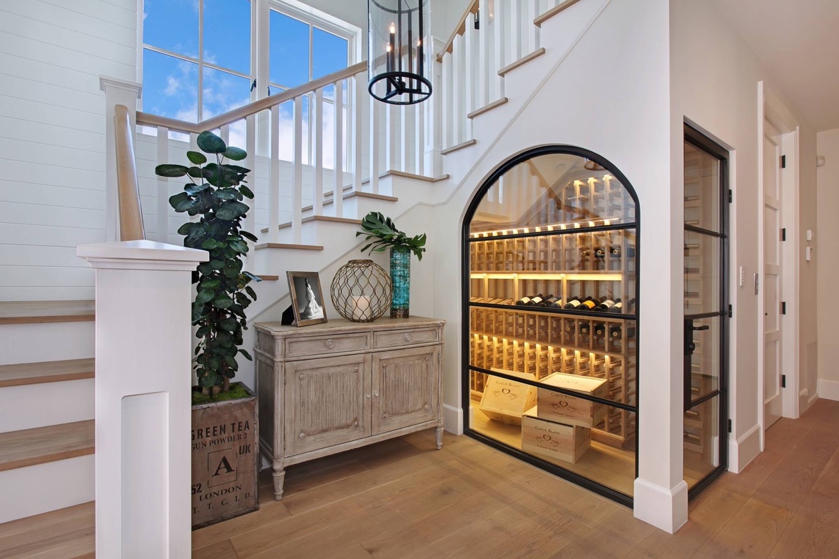 Beach Style Wine Cellar by Brandon Architects how to store wine